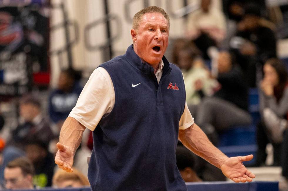 Coronado Head Coach Jeff Kaufman looks toward a referee for an explanation of a foul given duri ...