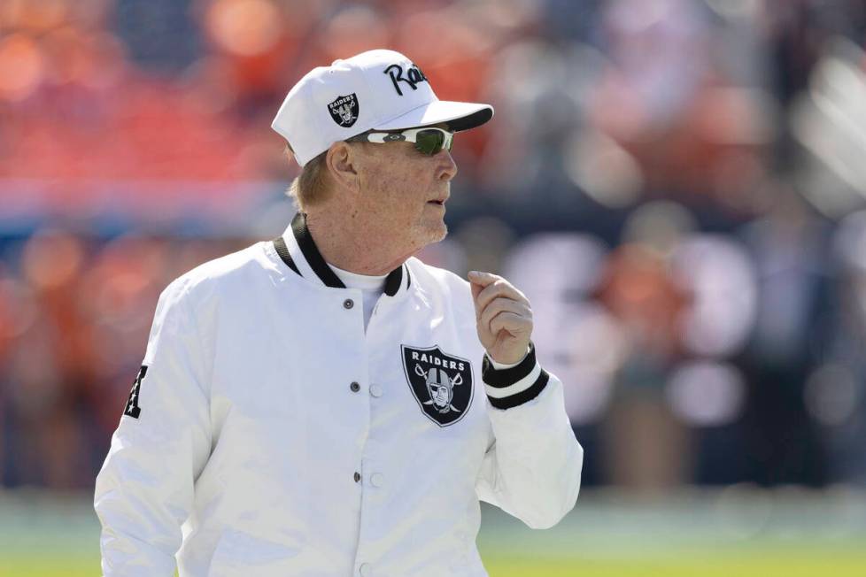 Raiders owner Mark Davis walks the sideline before an NFL game against the Denver Broncos at Em ...