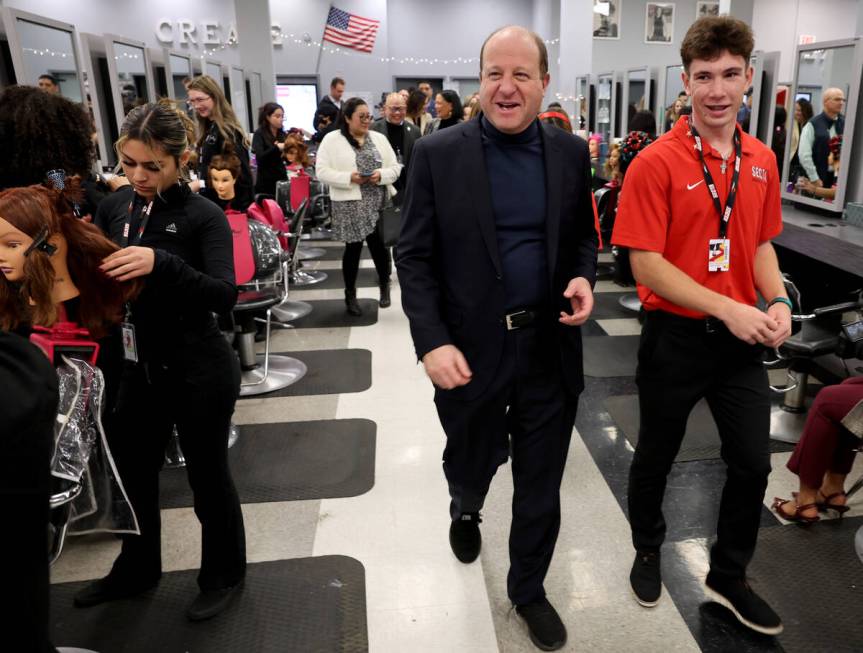 Southeast Career Technical Academy ambassador, Automotive major Tiernon Wolf, gives a tour of ...