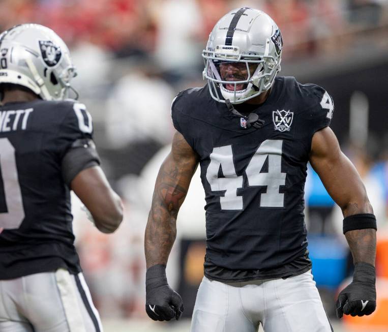 Raiders defensive end K'Lavon Chaisson (44) reacts after a big play during the first half of th ...