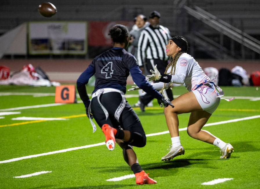 Liberty senior Kilolo Westerlund (4) looks to catch a pass during the high school flag football ...