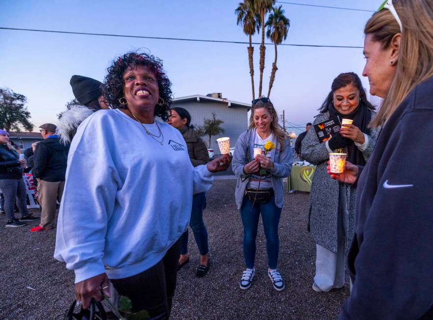 Attendees gather as they have their lit candles during the 31st Homeless Candlelight Vigil on T ...