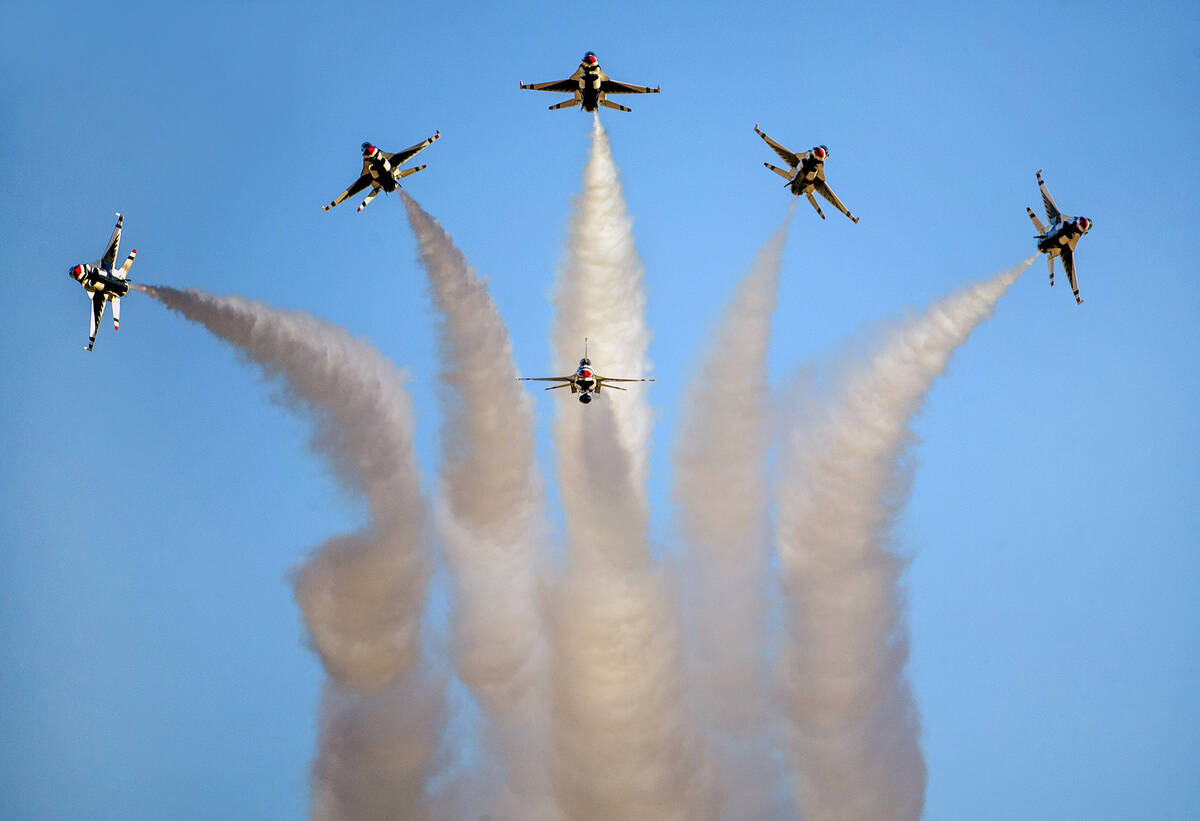 FILE - All six U.S. Air Force Thunderbirds break away from formation in various directions duri ...