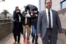 Alexander Smirnov, second left, leaves the Lloyd George U.S. Courthouse with his attorneys, Dav ...