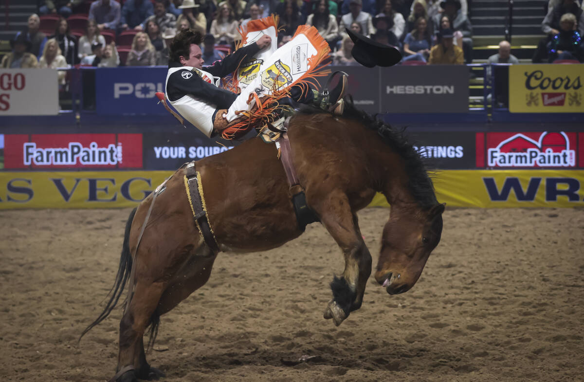 Cole Reiner competes in bareback riding during the 8th go-round of the National Finals Rodeo at ...