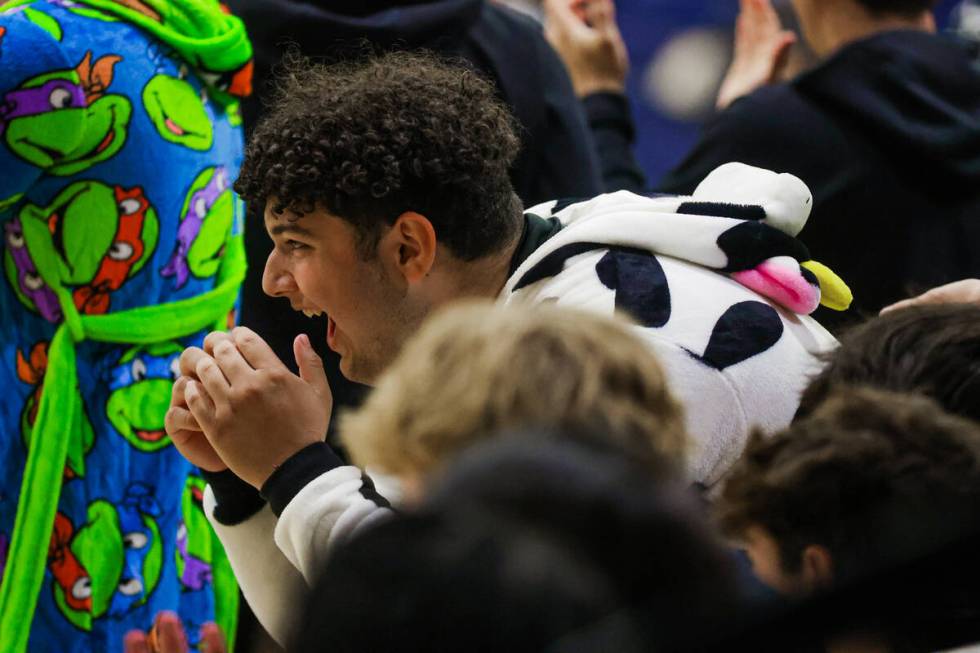 A Bishop Gorman student reacts to game action during a basketball game between Liberty and Bish ...