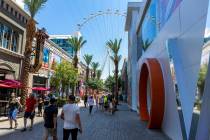 Visitors walk along The LINQ Promenade on Thursday, July 28, 2022, in Las Vegas. (L.E. Baskow/L ...