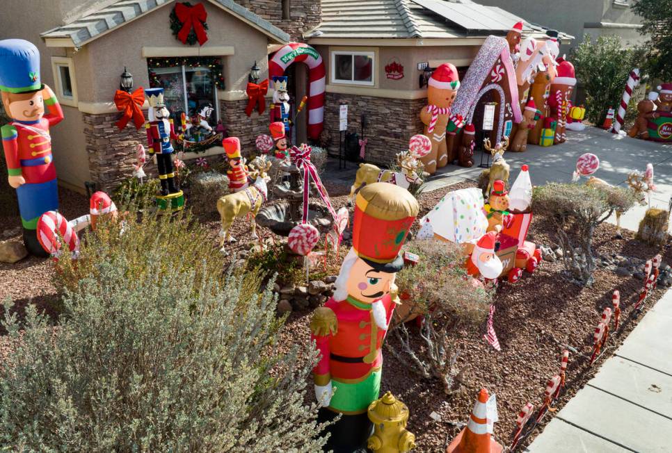 The extravagant Christmas decorating is seen outside Joey Cardona and husband Victor Cardenas' ...