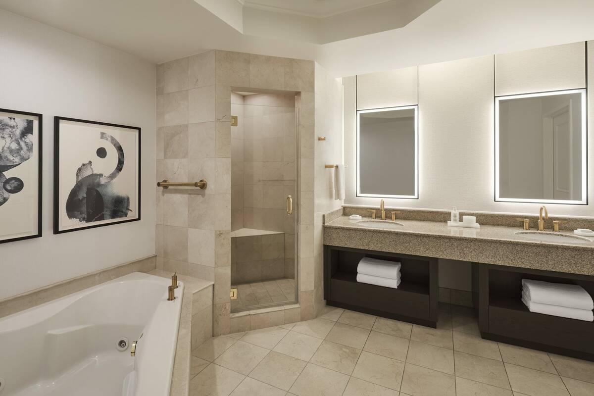 A deluxe king and queen bathroom in the spa tower of JW Marriott in Summerlin. The hotel and Ra ...