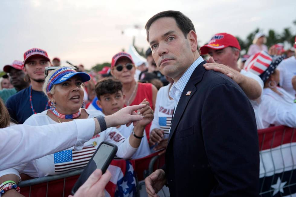 Sen. Marco Rubio, R-Fla., arrives before Republican presidential candidate former President Don ...