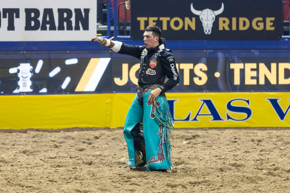 Jess Pope dances the “Macarena” after competing in the bareback riding event duri ...