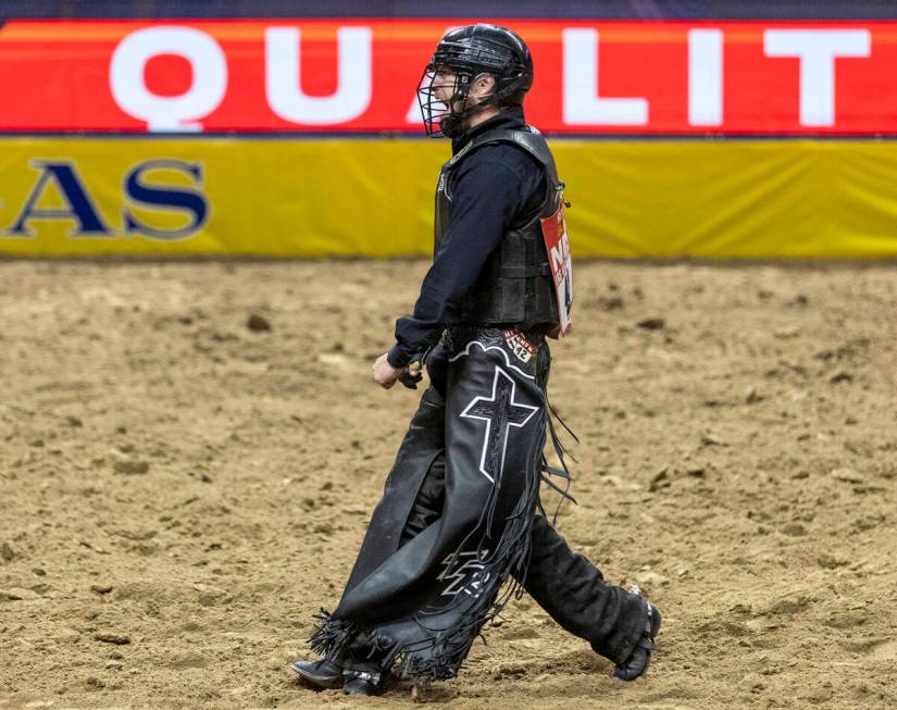 Trevor Reiste celebrates after competing in the bull riding event during day nine of the Nation ...