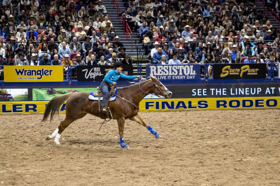 Shelley Morgan competes in the barrel racing event during day nine of the National Finals Rodeo ...