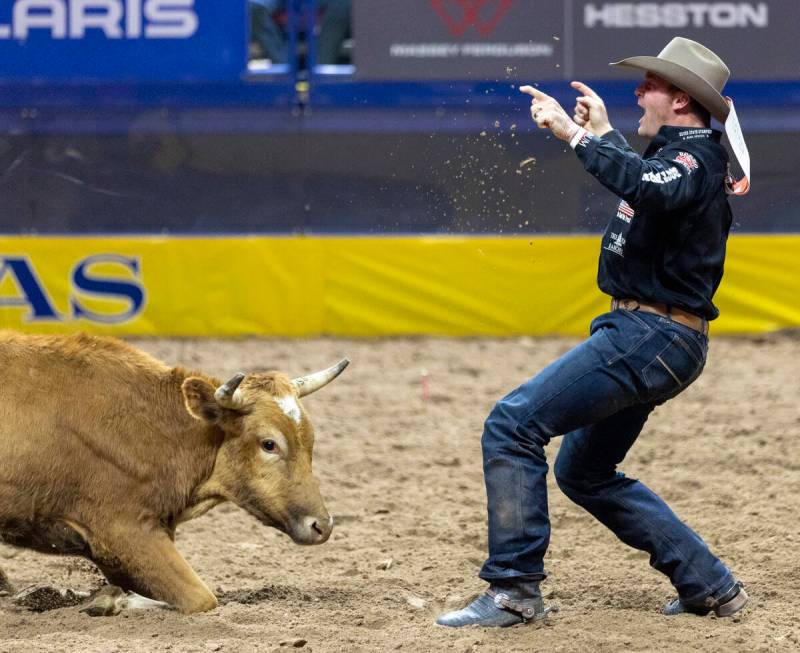 Dakota Eldridge competes in the steer wrestling event during day nine of the National Finals Ro ...