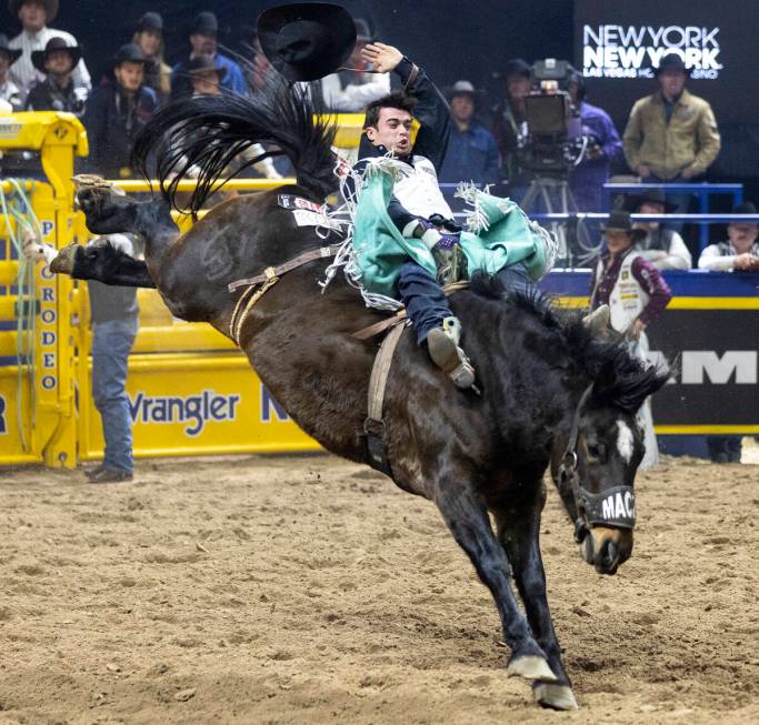 Bradlee Miller competes in the bareback riding event during day nine of the National Finals Rod ...