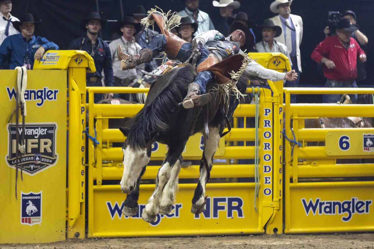 Richmond Champion competes in the bareback riding event during day nine of the National Finals ...