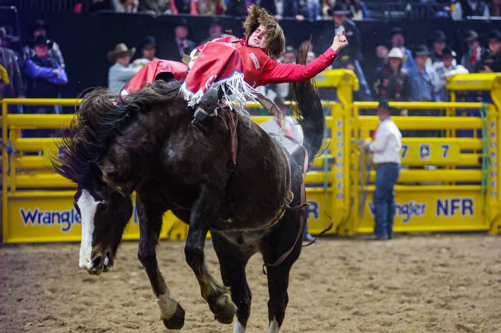 Bareback rider Rocker Steiner completes his ride on OLS Tubs Stevie Knicks during the final nig ...