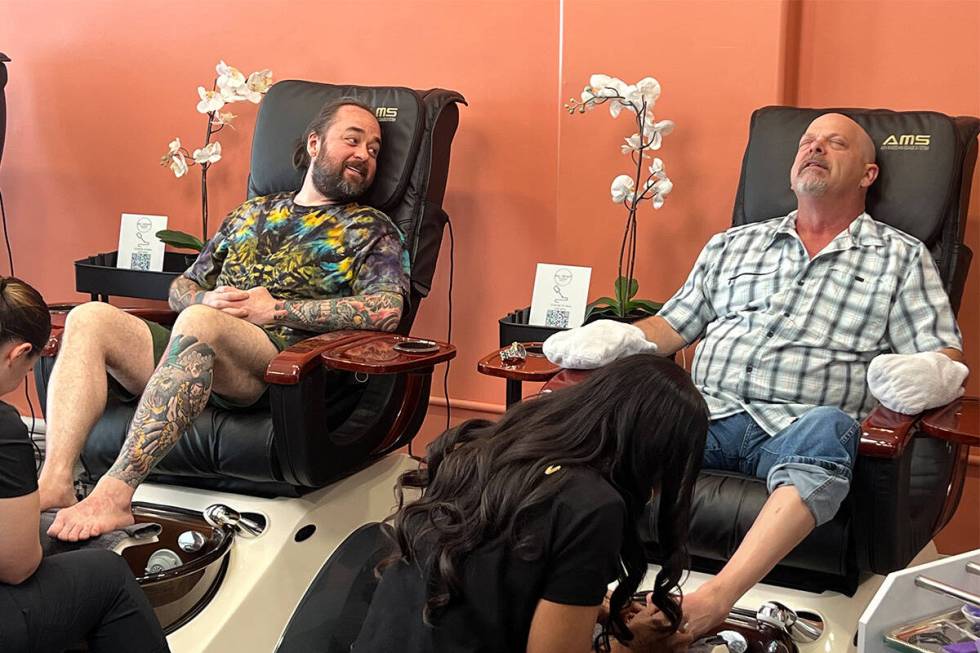 Austin "Chumlee" Russell, left, and Rick Harrison of "Pawn Stars" are shown getting pedicures a ...