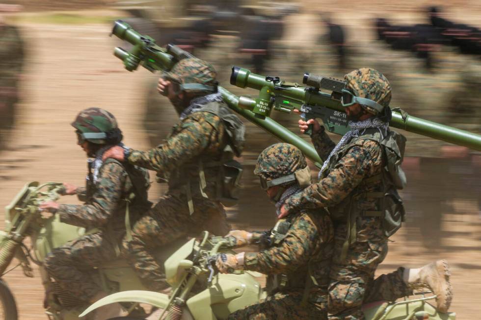 FILE - Fighters from the Lebanese terrorist group Hezbollah train in southern Lebanon, May 21, ...