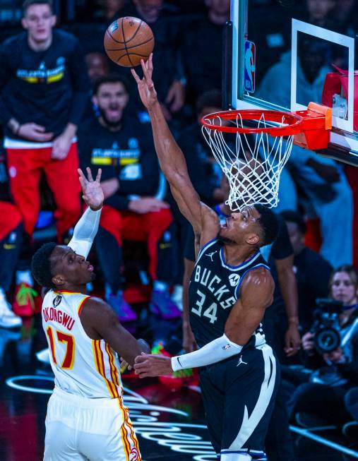 Atlanta Hawks forward Onyeka Okongwu (17) has a shot blocked b y Milwaukee Bucks forward Gianni ...