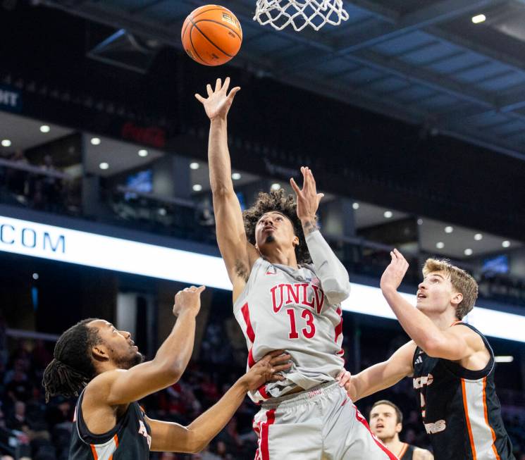 UNLV guard Brooklyn Hicks (13) attempts a shot during the Jack Jones Classic college basketball ...