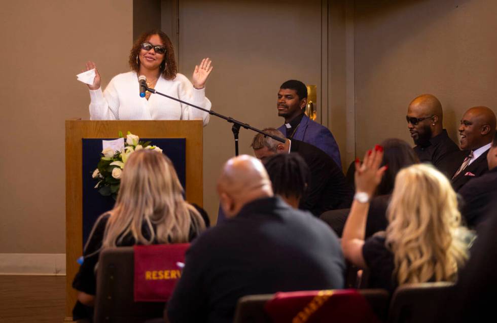 Isabella Durham talks about her late father, Brandon Durham, during the funeral service at Davi ...