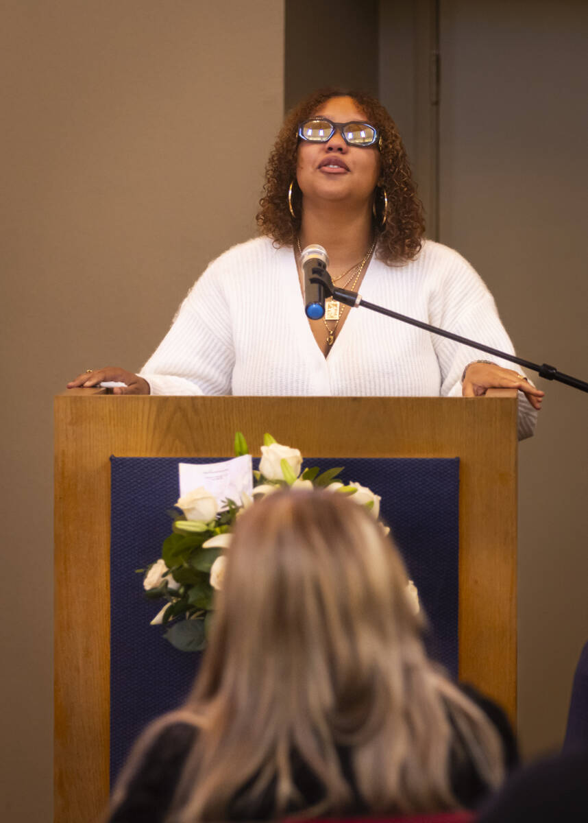 Isabella Durham talks about her late father, Brandon Durham, during the funeral service at Davi ...