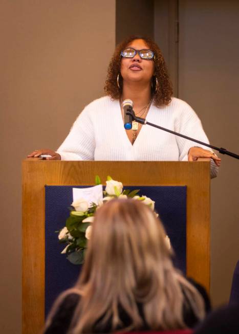 Isabella Durham talks about her late father, Brandon Durham, during the funeral service at Davi ...