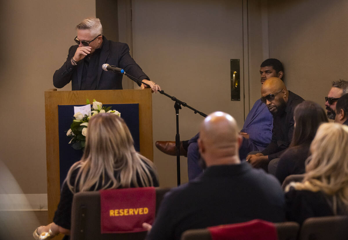 Steve Cowan, a close friend of Brandon Durham, pauses while speaking during the funeral service ...