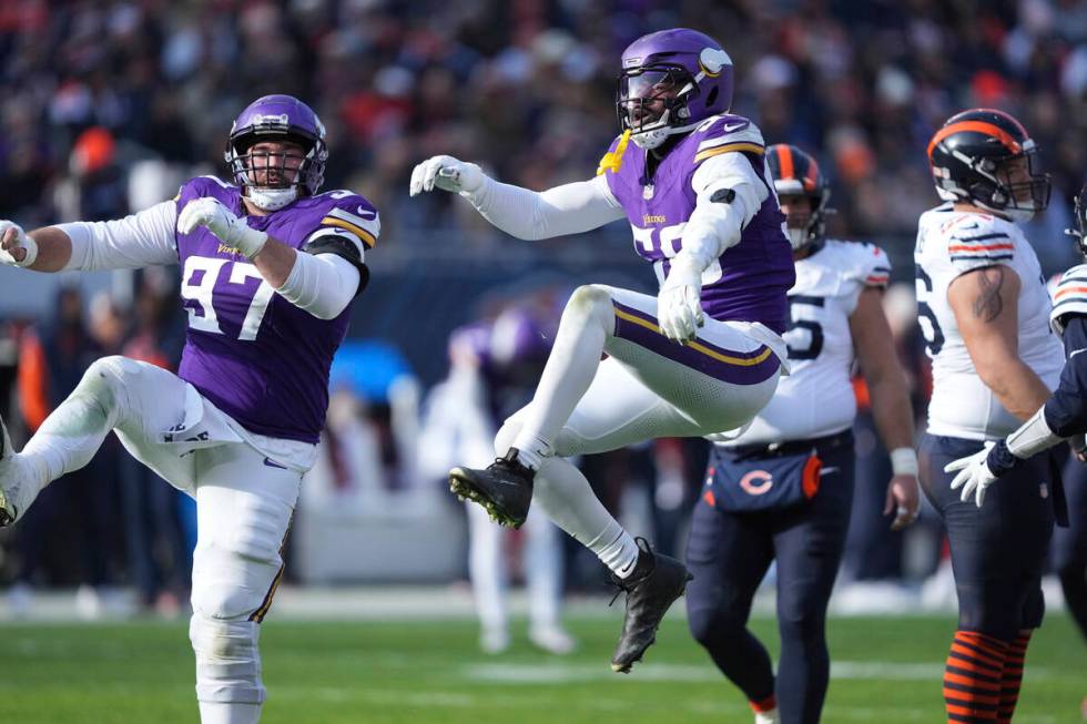 Minnesota Vikings linebacker Jonathan Greenard (58) celebrates after sacking Chicago Bears quar ...