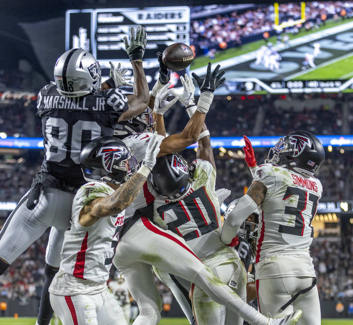 *Raiders wide receiver Terrace Marshall Jr. (80)is in great position to grab a Hail Mary pass a ...