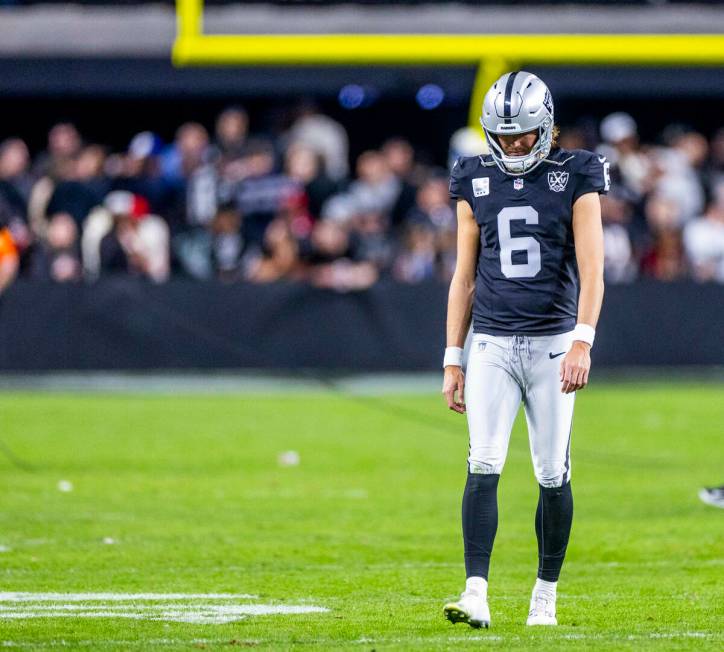 Raiders punter AJ Cole (6) walks off the field dejected after a loss to the Atlanta Falcons dur ...