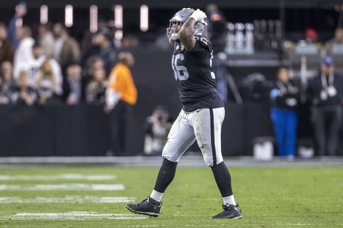 Raiders defensive tackle Jonah Laulu (96) celebrates a sack of Atlanta Falcons quarterback Kirk ...