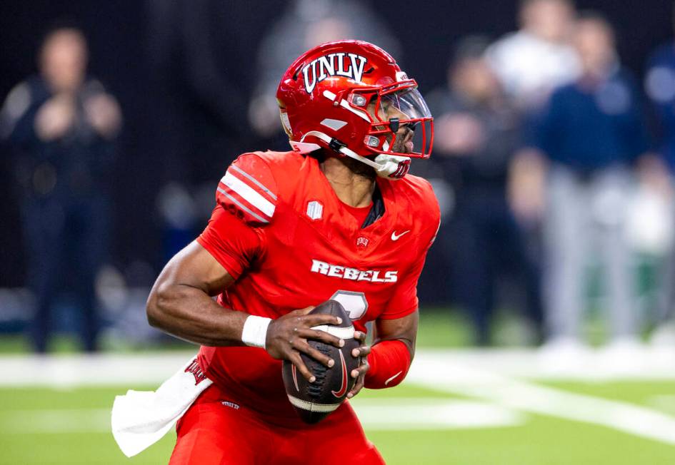 UNLV quarterback Hajj-Malik Williams (6) looks to throw the ball during the NCAA college footba ...