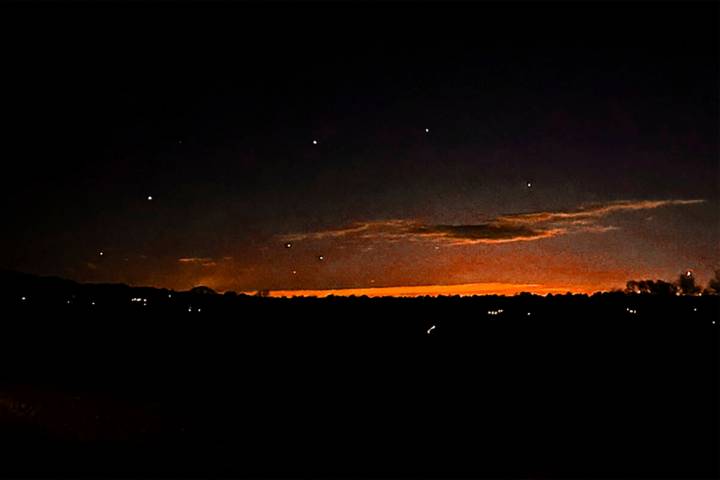 This photo provided by Trisha Bushey shows the evening sky and points of light near in Lebanon ...