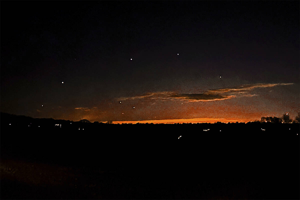 This photo provided by Trisha Bushey shows the evening sky and points of light near in Lebanon ...