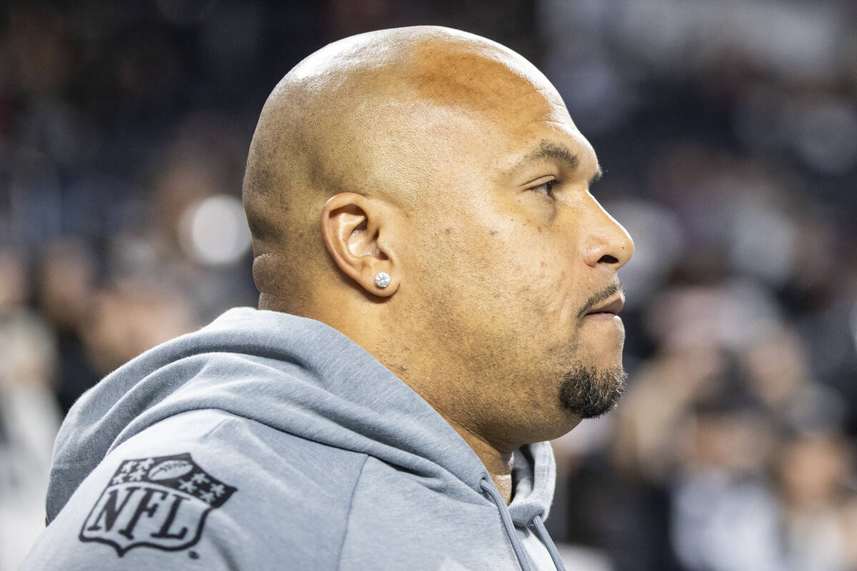 Raiders head coach Antonio Pierce runs onto the field before the NFL game against the Atlanta F ...