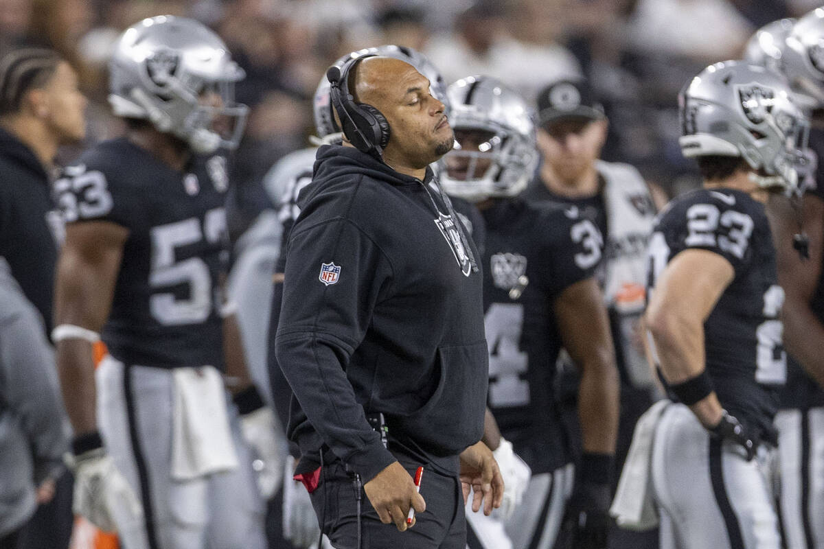 Raiders head coach Antonio Pierce reacts to a play against the Atlanta Falcons during the first ...