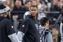 Raiders defensive end Charles Snowden on the sideline during the first half of an NFL game agai ...