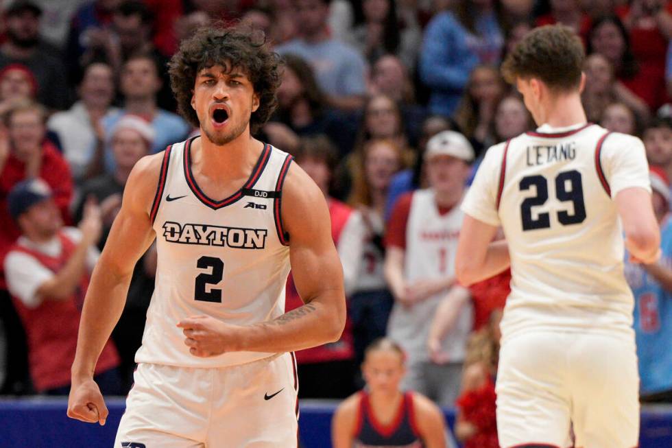 Dayton's Nate Santos (2) reacts during the second half of an NCAA college basketball game again ...