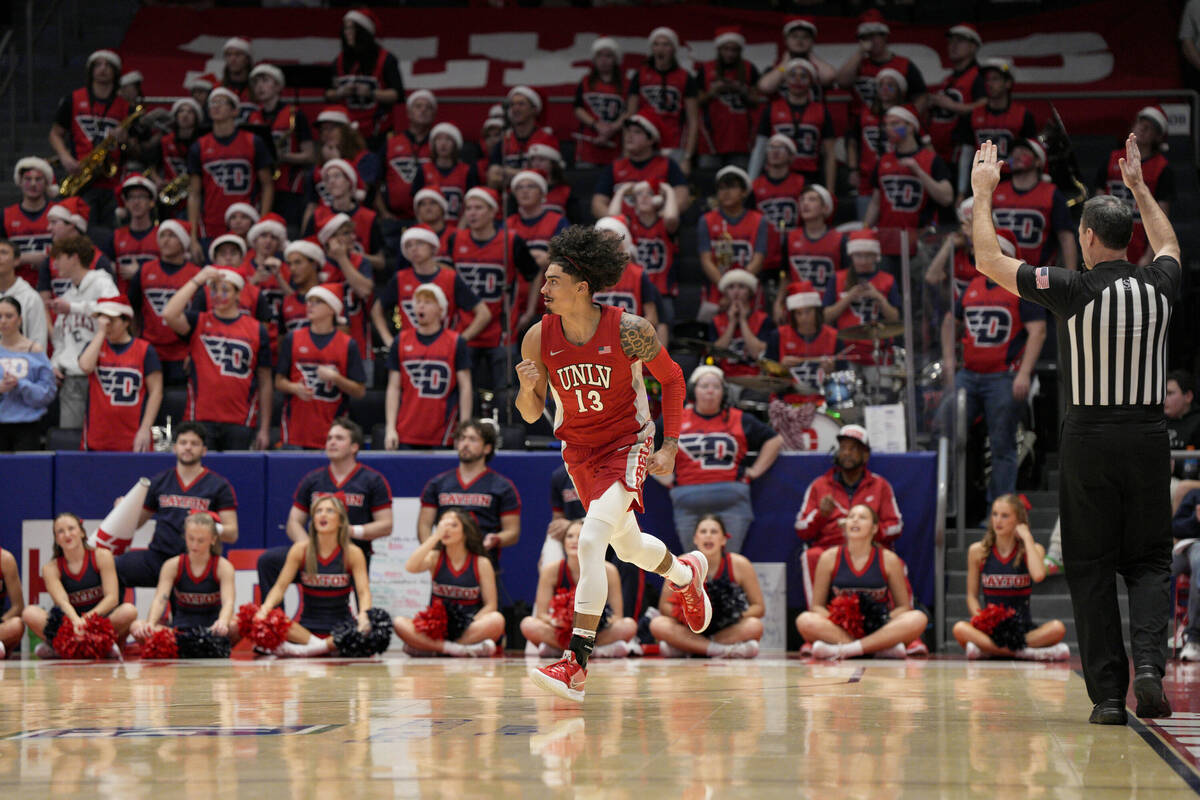 UNLV guard Brooklyn Hicks (13) reacts after scoring during the second half of an NCAA college b ...