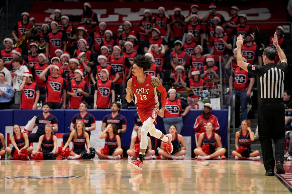 UNLV guard Brooklyn Hicks (13) reacts after scoring during the second half of an NCAA college b ...