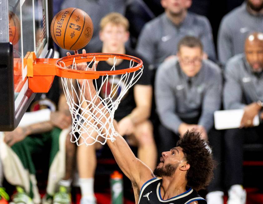 Milwaukee Bucks guard Andre Jackson Jr. (44) attempts a layup during the first half of the NBA ...