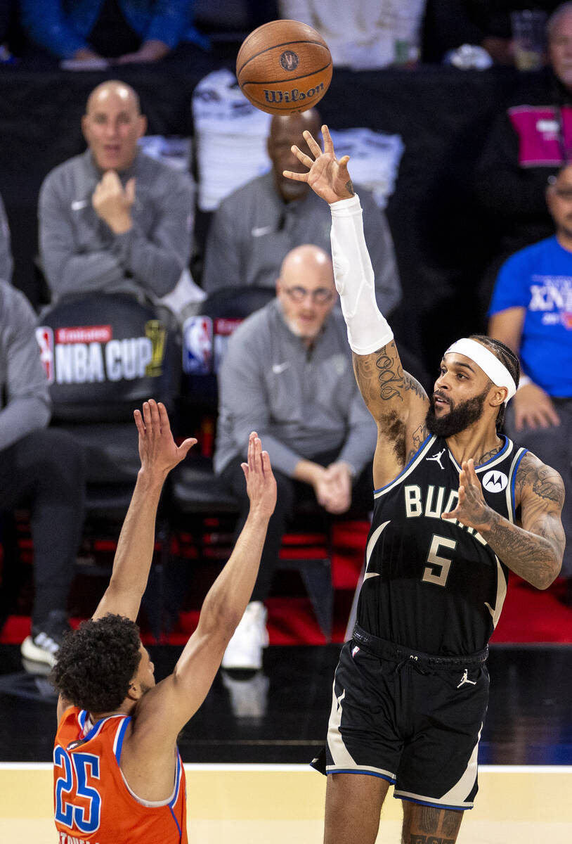 Milwaukee Bucks guard Gary Trent Jr. (5) attempts a shot over Oklahoma City Thunder guard Ajay ...