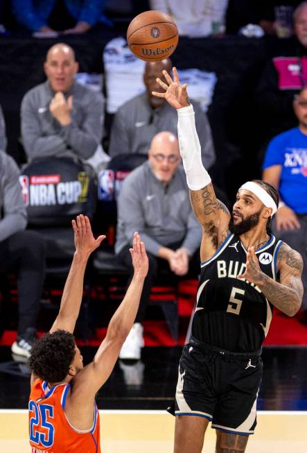 Milwaukee Bucks guard Gary Trent Jr. (5) attempts a shot over Oklahoma City Thunder guard Ajay ...