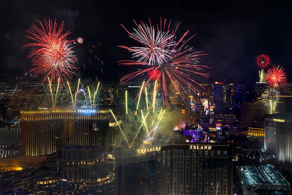 New Year’s Eve fireworks erupt above the Strip viewed from atop the Trump Tower on Sunda ...