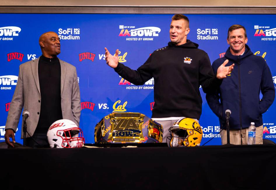 Four-time Super Bowl champion and host of the LA Bowl Rob Gronkowski, center, speaks alongside ...