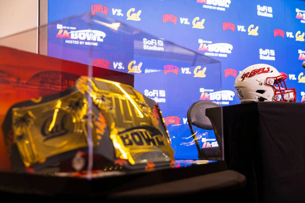 The LA Bowl trophy, styled as a championship belt, is seen before a press conference at SoFi St ...