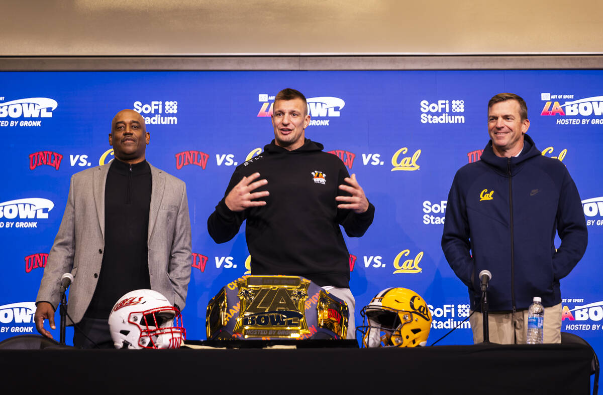 Four-time Super Bowl champion and host of the LA Bowl Rob Gronkowski, center, speaks alongside ...