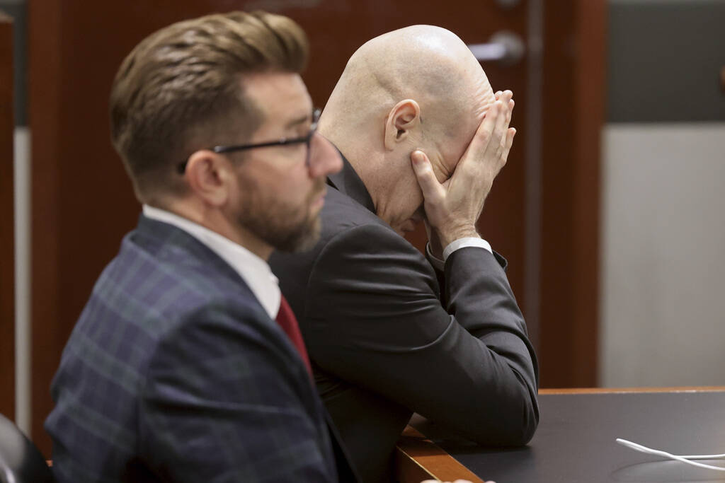 Robert Telles reacts as his wife, Mary Ann Ismael, talks on the witness stand during the penalt ...